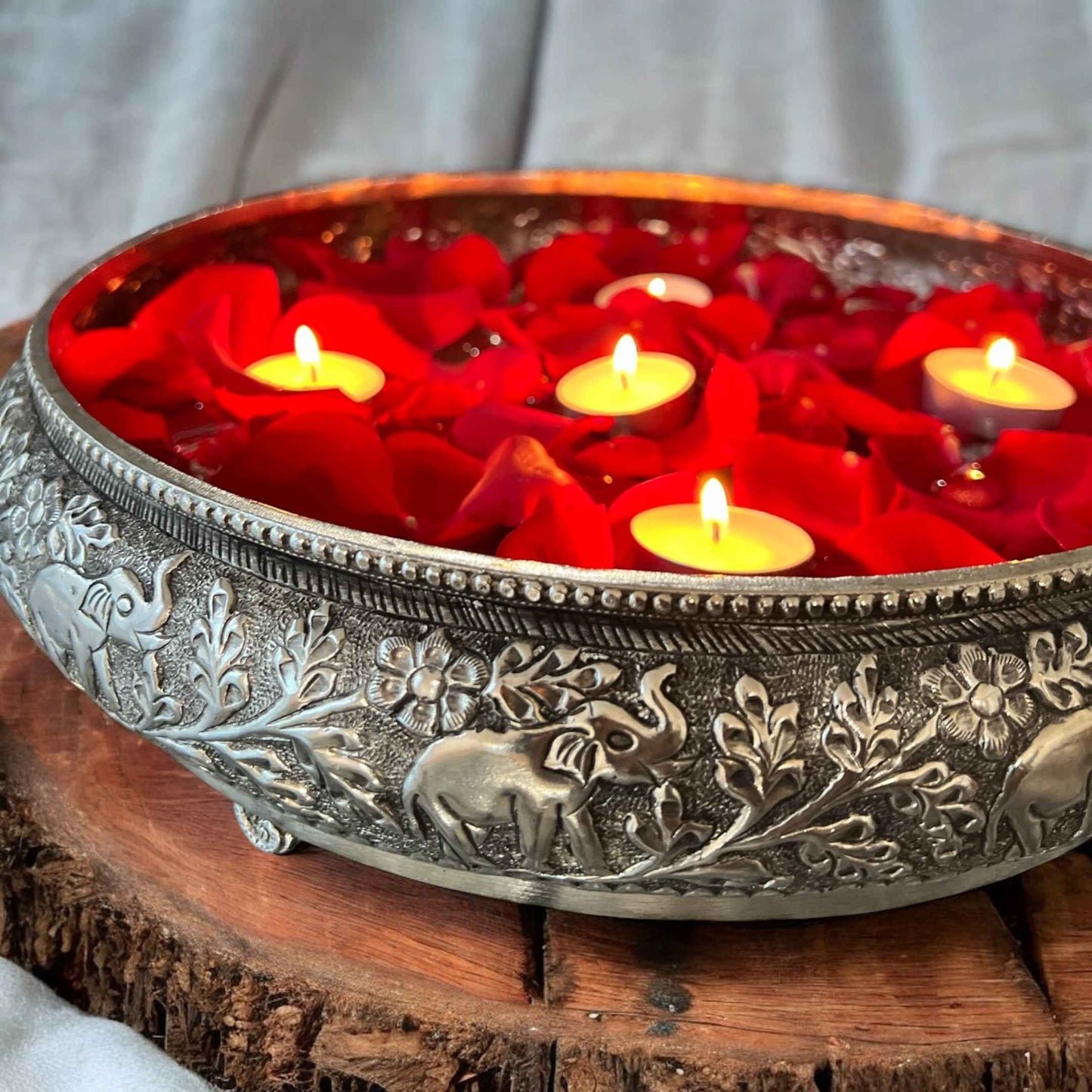 Indian silver bowl with detailed elephant carvings, ideal for festive and spiritual settings