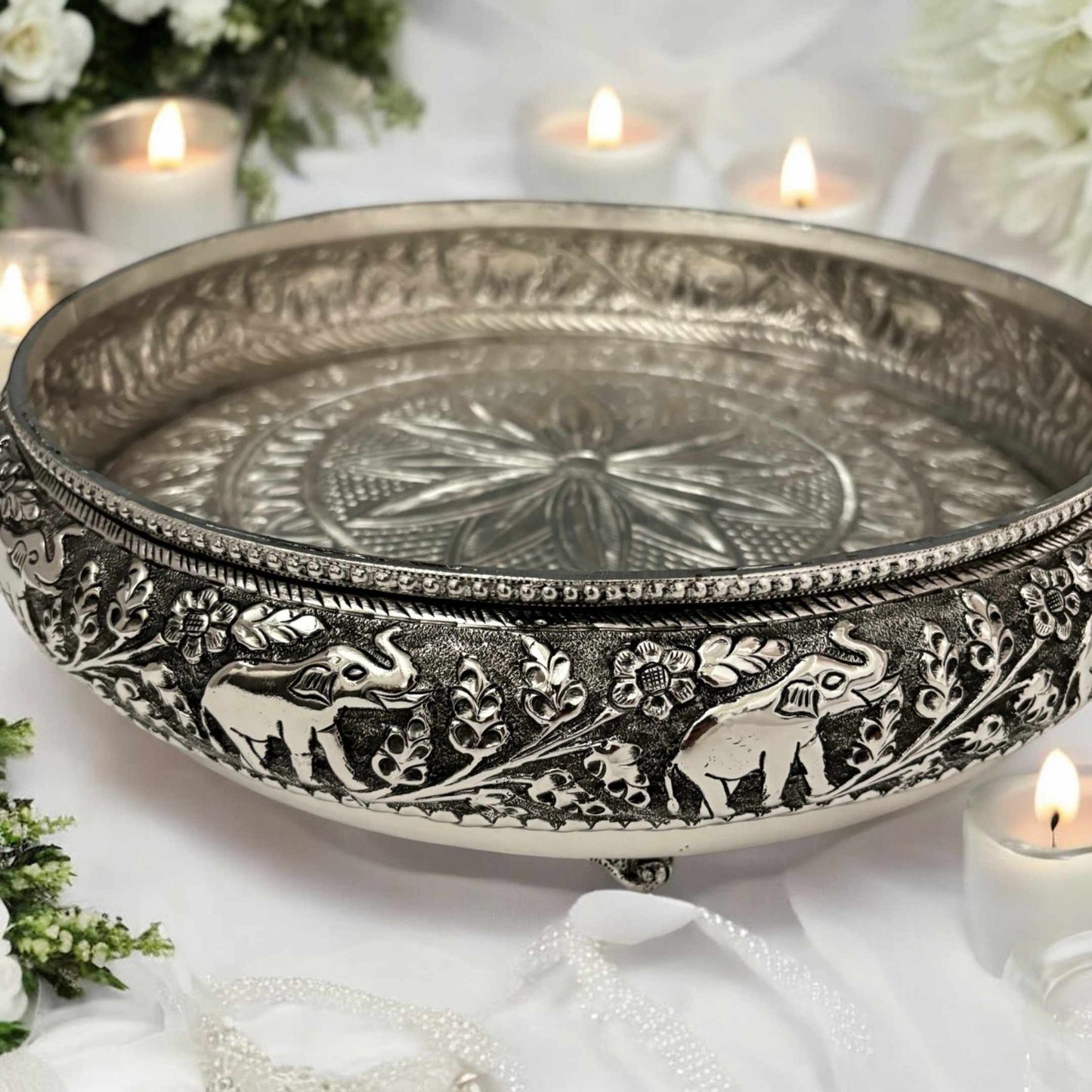 Beautifully designed german silver urli with ornate patterns, enhancing any space with elegance