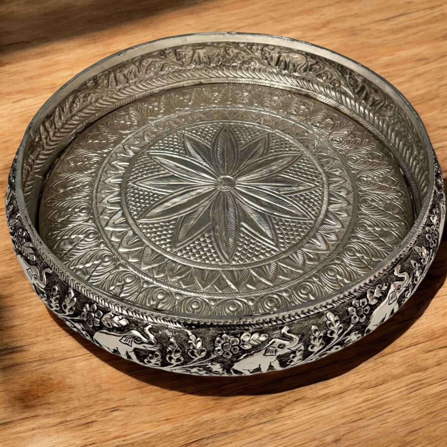 Traditional 13.5-inch german silver urli with elephant motifs, perfect for adding cultural charm
