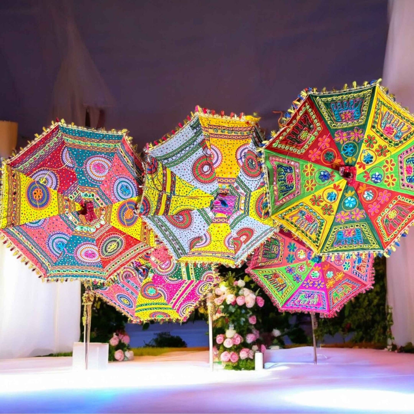 Set of bulk umbrellas in assorted Bandhani designs, ideal for large events or festive decorations