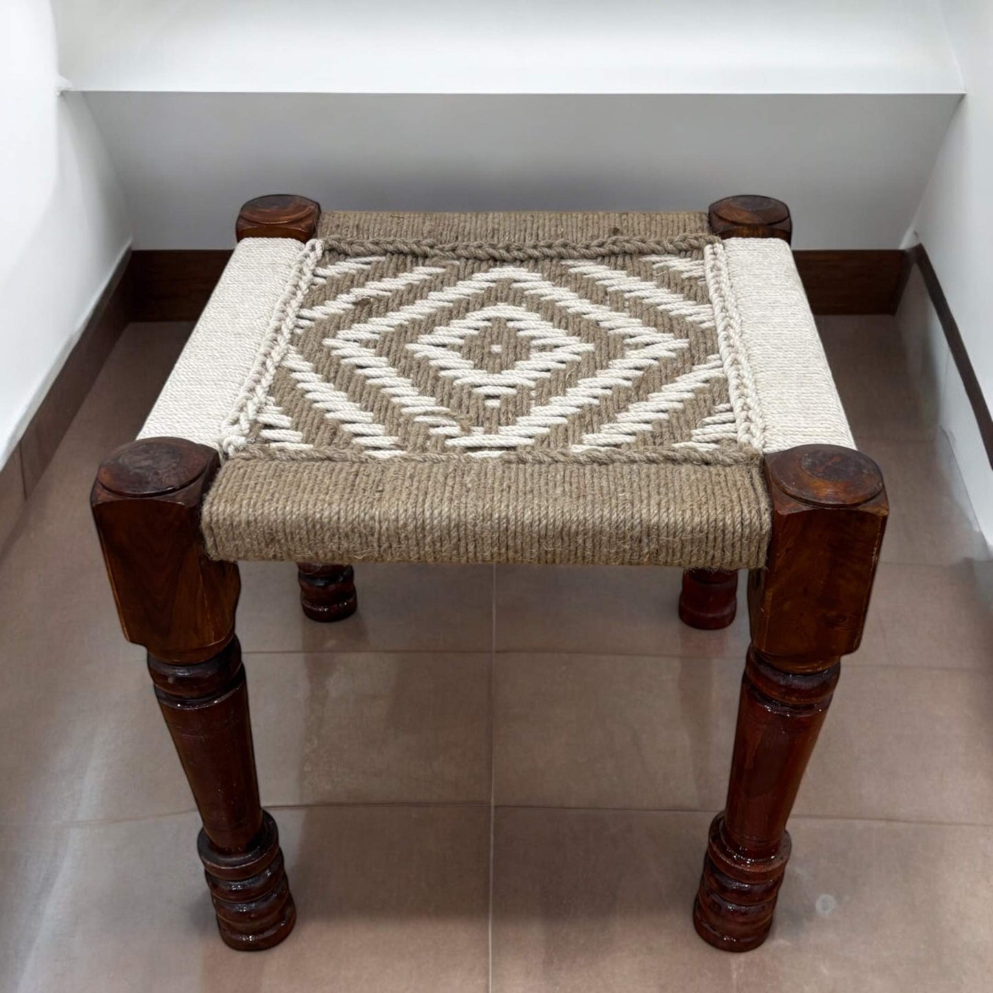 Detailed view of the natural jute cord weaving, highlighting the artisanal craftsmanship and texture.