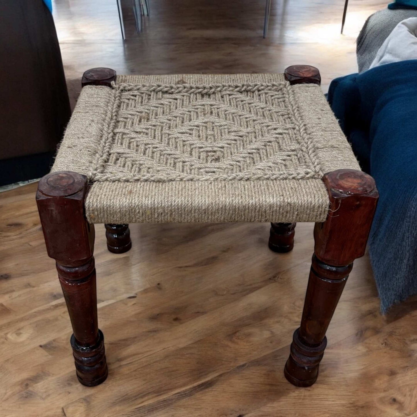 Detailed view of the natural jute cord weaving, highlighting the artisanal craftsmanship and texture.