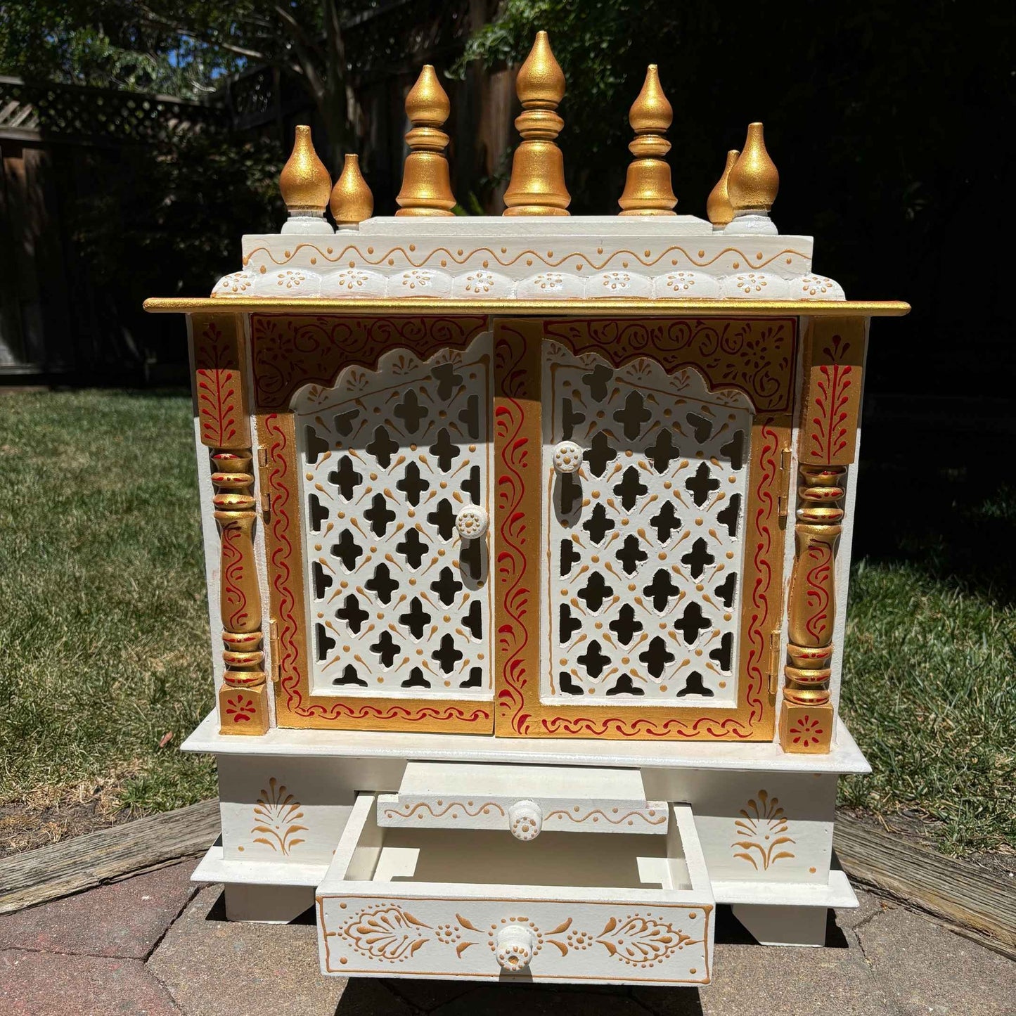 handcrafted white and gold wooden temple. Designed for compact spaces, it’s perfect for homes, offices, and shops, especially for NRIs in the USA