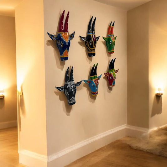 Artisan wall mask featuring a hand-painted Nandi bull, crafted with traditional carving and folk art decor for a heritage wall piece