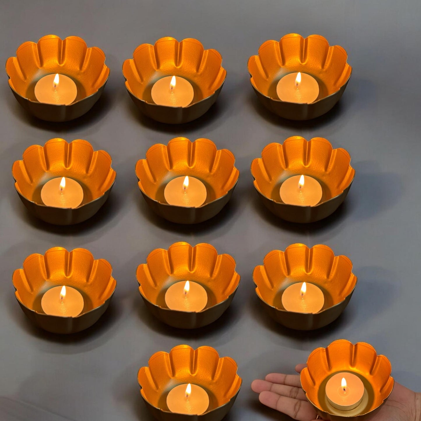 The complete set of 10 diyas arranged in a decorative pattern, perfect for festive home decor