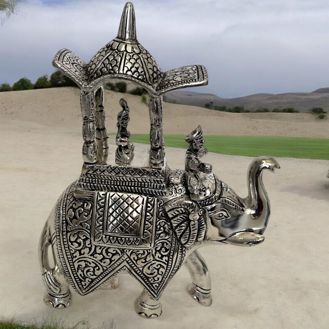 Side profile of the Walking Ambabari Elephant statue, highlighting the detailed engravings on the headdress and body.