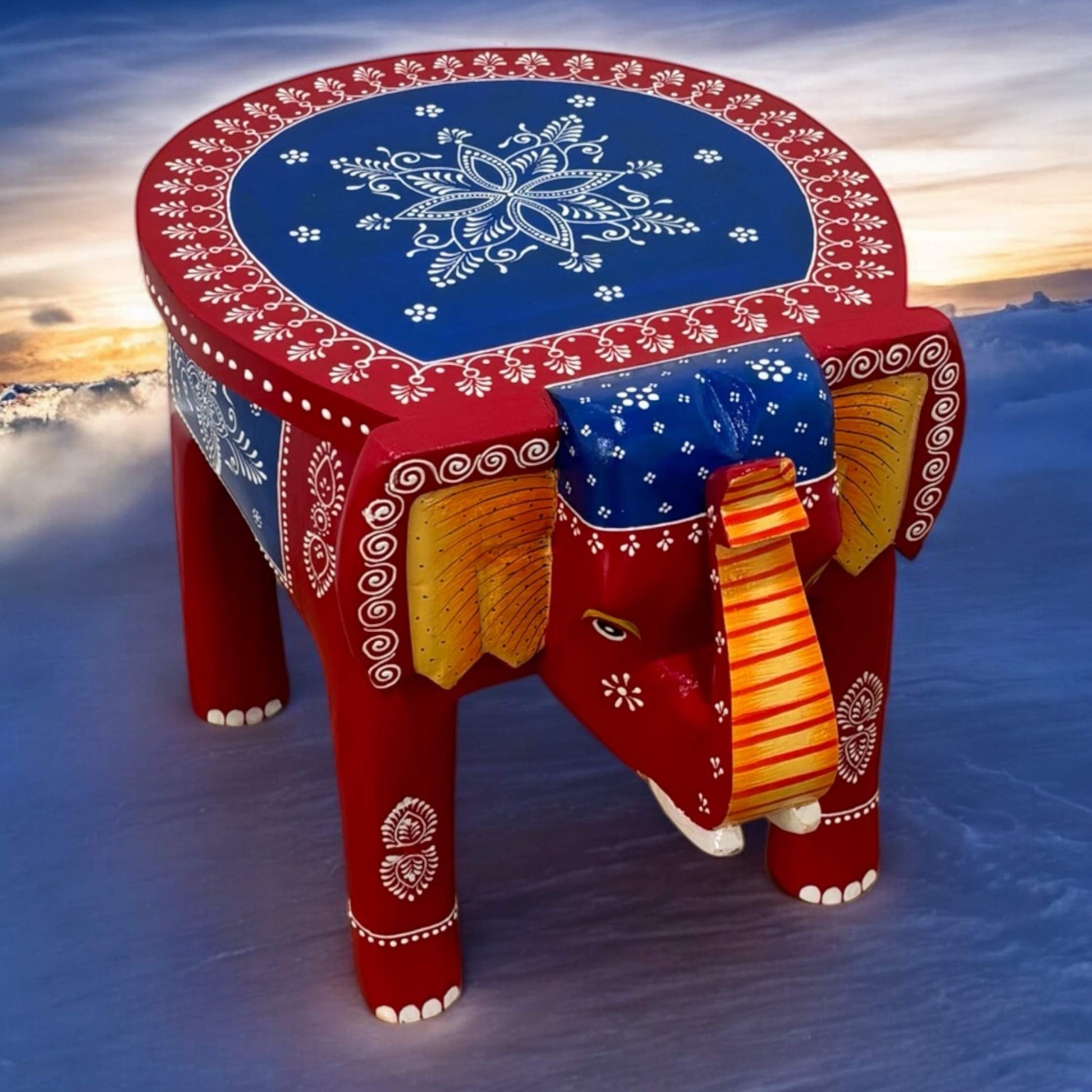 Top view of the wooden elephant stool showcasing its smooth round tabletop and natural finish