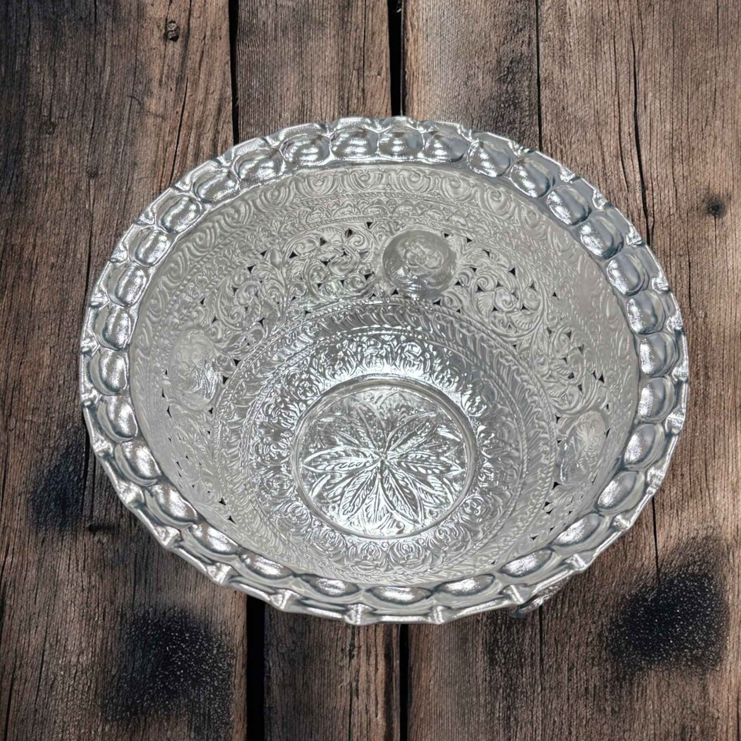Overhead shot of the bowl, providing a clear view of its 9.5-inch diameter and the smooth, polished interior surface, reflecting light gracefully