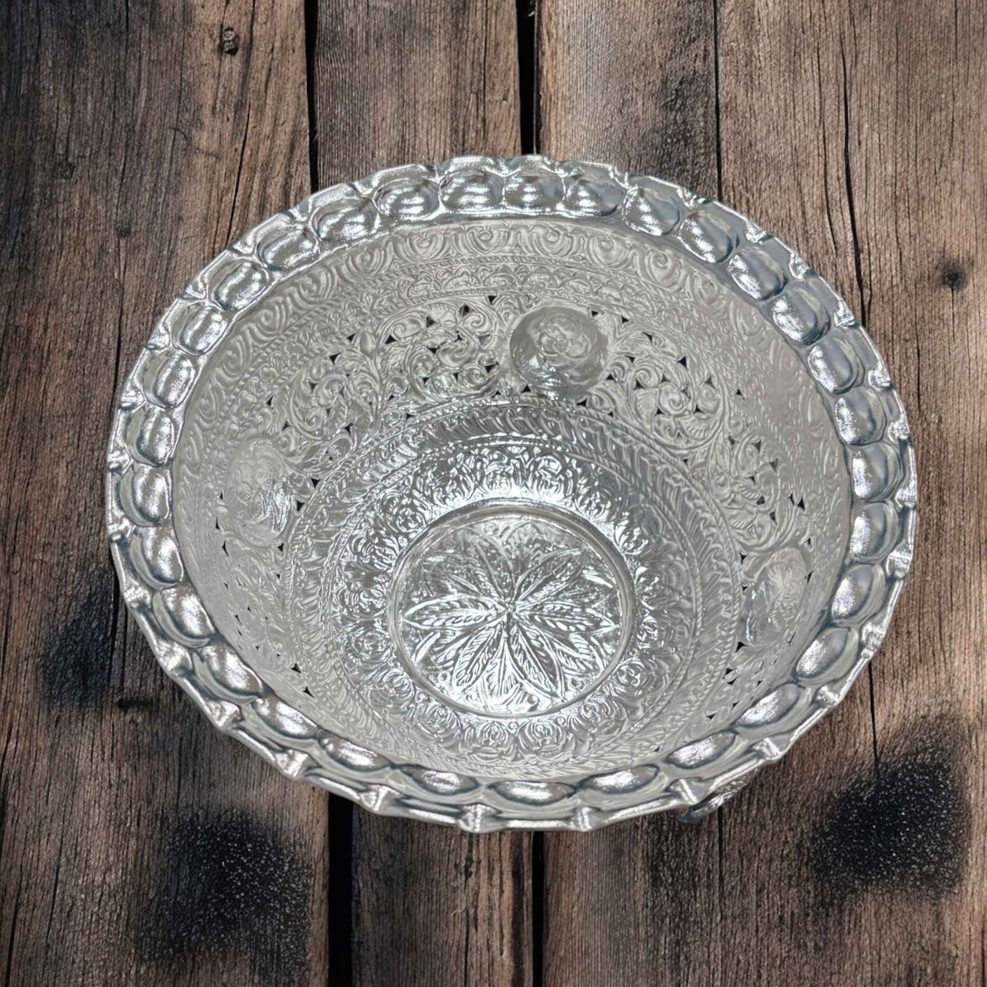Overhead shot of the bowl, providing a clear view of its 9.5-inch diameter and the smooth, polished interior surface, reflecting light gracefully