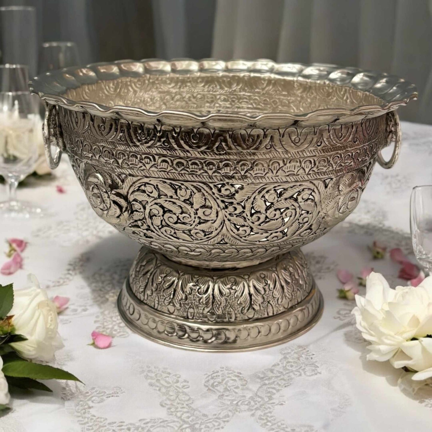 The fruit bowl integrated into a festive table setting, demonstrating its versatility for occasions like weddings, anniversaries, or holiday celebrations
