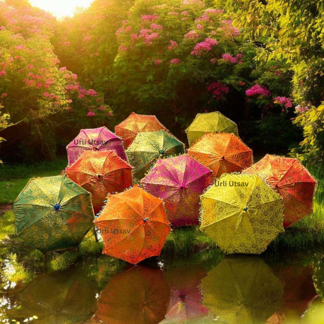 Vibrant silk umbrella adorned with golden motifs, suitable for use as a decorative backdrop