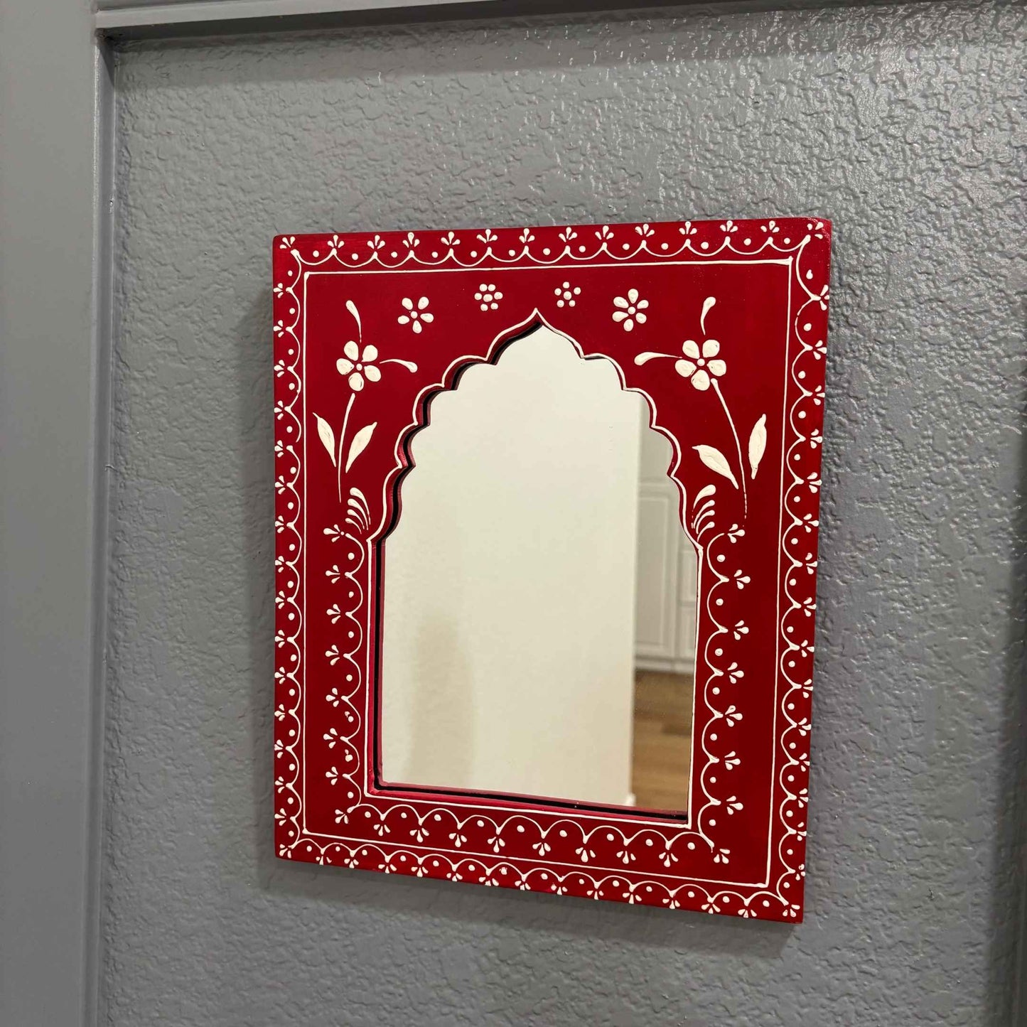 Wine Red Jharokha mirror in Rajasthani style from Urli Utsav, highlighting its ornate frame and mirror quality