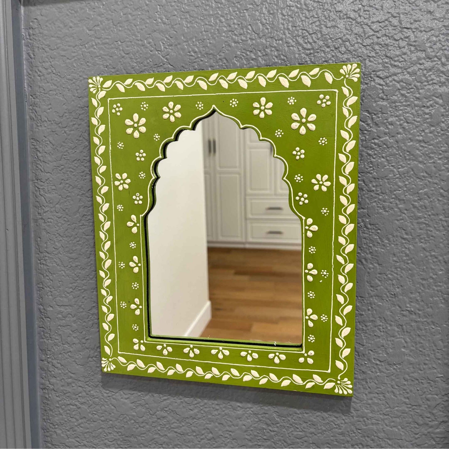 Lime Green Jharokha mirror, emphasizing its depth and the quality of the hand-painted artwork