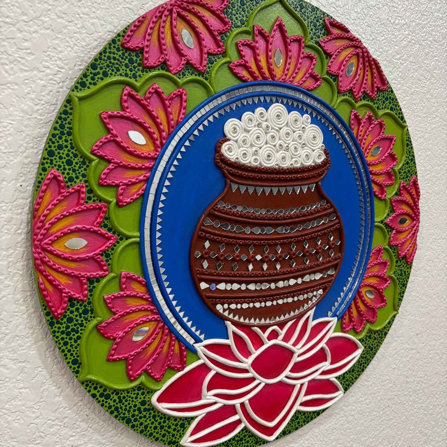 Close-up of 18-inch Dahihandi Lippan wall art showcasing vibrant hand-painted details, traditional mirror embellishments, and cultural craftsmanship.