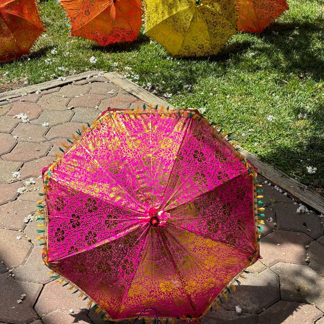 Elegant golden print umbrella made of premium silk, ideal for adding a touch of luxury to any event