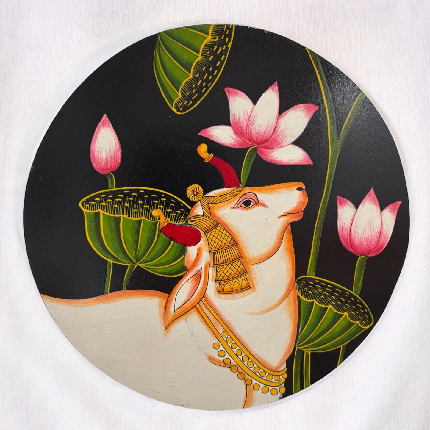 Handpainted Lotus Pichwai Cow wall plate featuring intricate traditional Indian art with vibrant colors, depicting the divine couple in a bohemian style