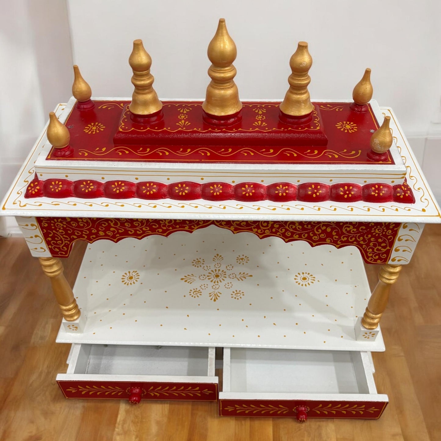 Spacious pooja mandir with multiple shelves for deities and accessories