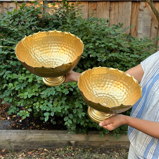 Close-up of a handcrafted lotus-shaped decorative urli bowl with intricate engraving, ideal for home decor