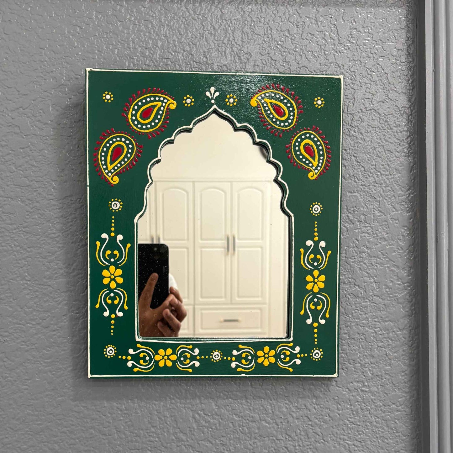 Handmade Green Jharokha Mirror Frame By Urli Utsav Decor is a timeless piece that adds elegance and tradition to any space.