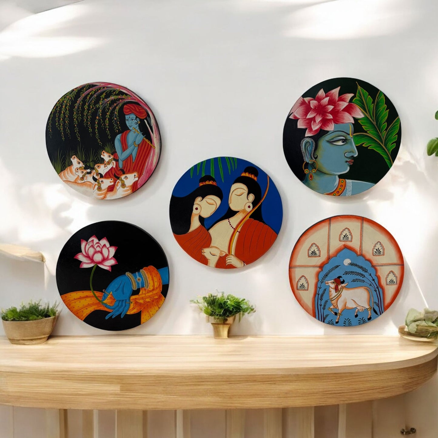 Set of handpainted boho wall plates showcasing various designs inspired by Indian art and modern bohemian themes, perfect for gallery walls