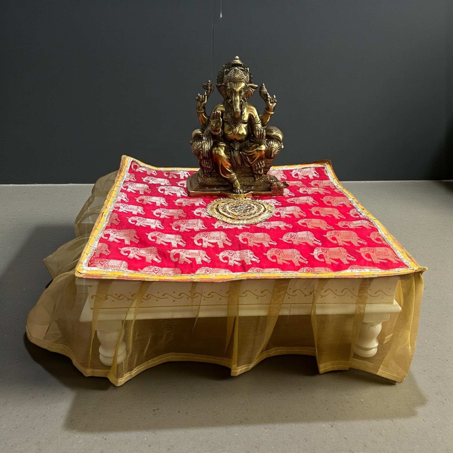 Urli Utsav Bajot premium cover with elephant print featuring Ganesha idol in elegant home decor setup