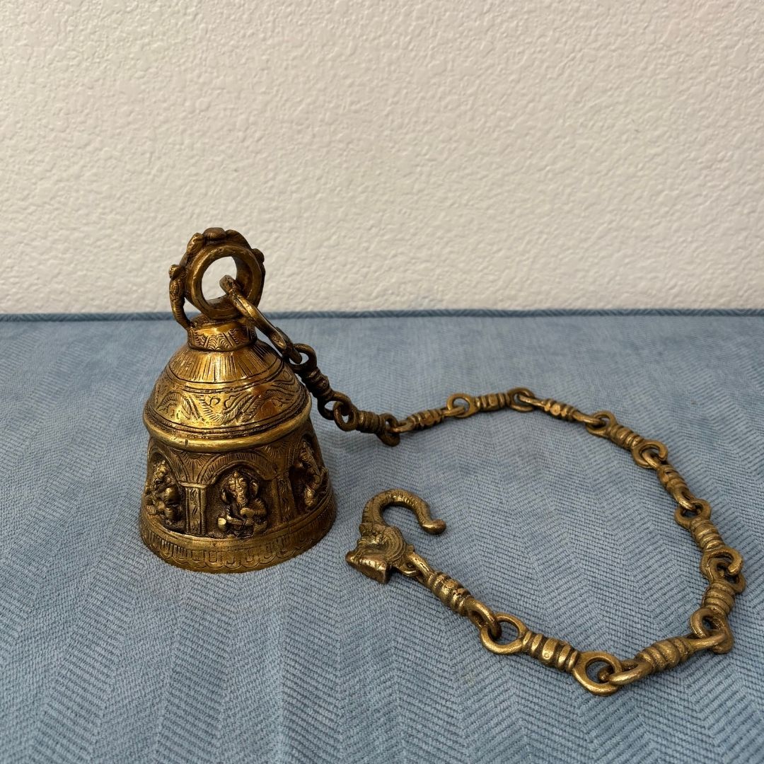 brass bell with ganesha engraving