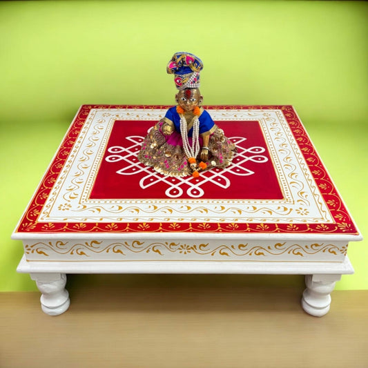 White and red wooden pooja chowki with kolam design – perfect chowki for god idols, puja table, and Indian spiritual home decor