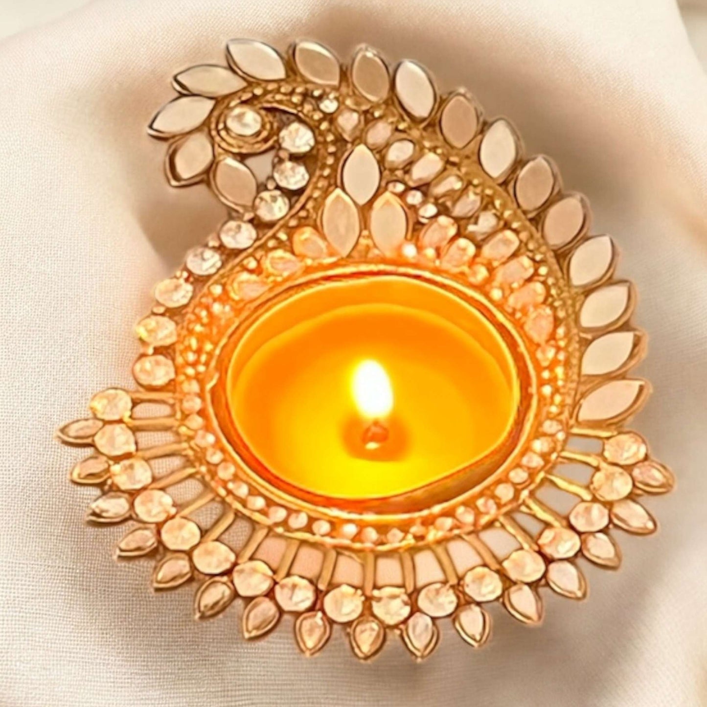 Mango paisley gold mirror diya—premium metal tealight holder close-up