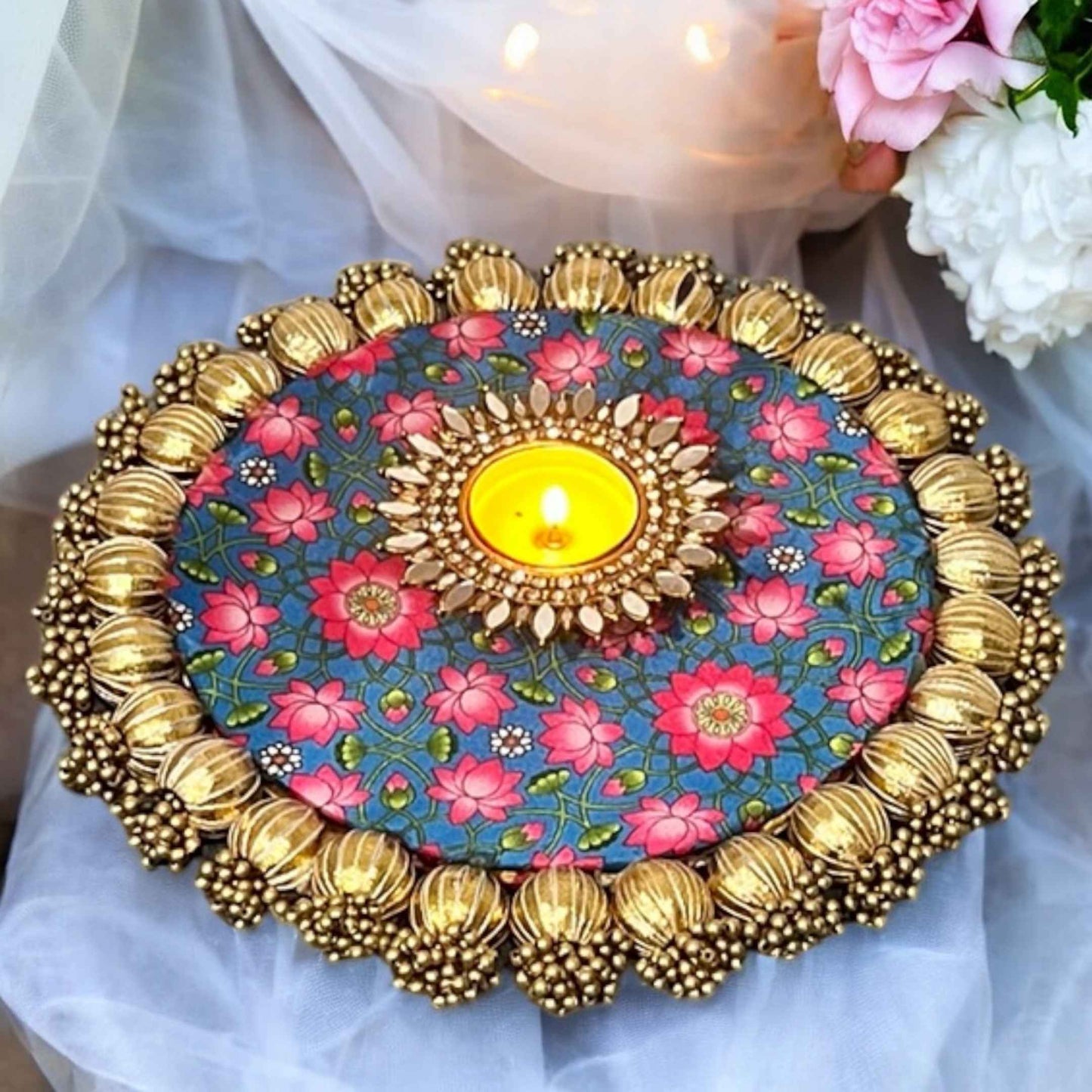 Handmade Indian mirror work candle holders glowing with t-lights