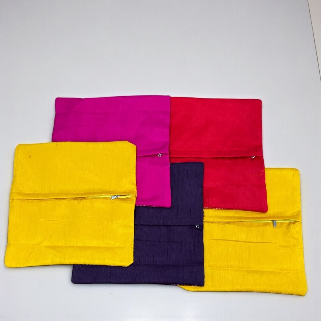 Bandhani silk brocade fabric swatches in yellow, pink, red, purple — color palette for 16×16 cushion covers.