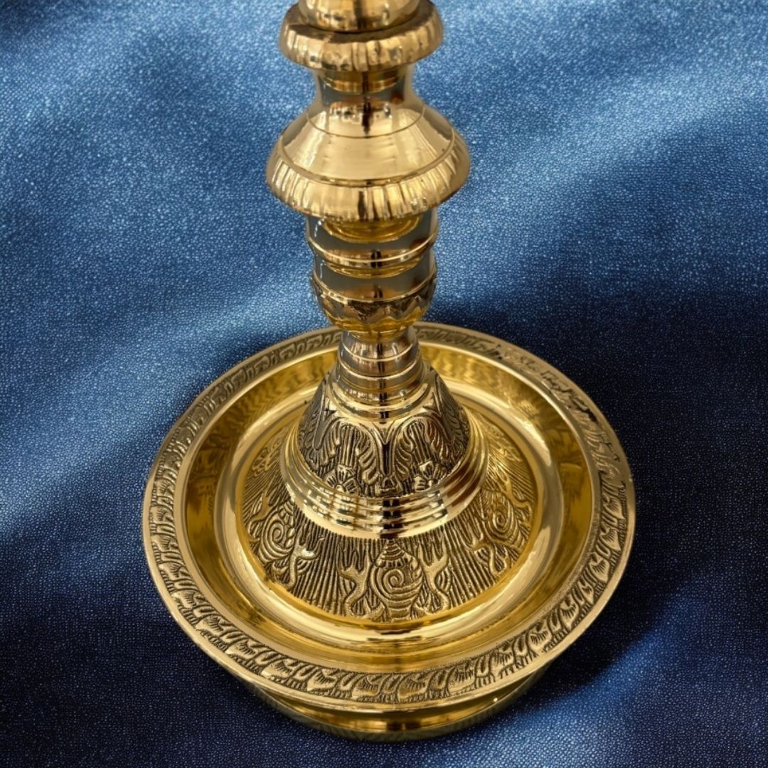 Close-up of the brass Mahabharat Diya, highlighting detailed craftsmanship; a quintessential Indian lamp for pooja and festive 2025 celebrations