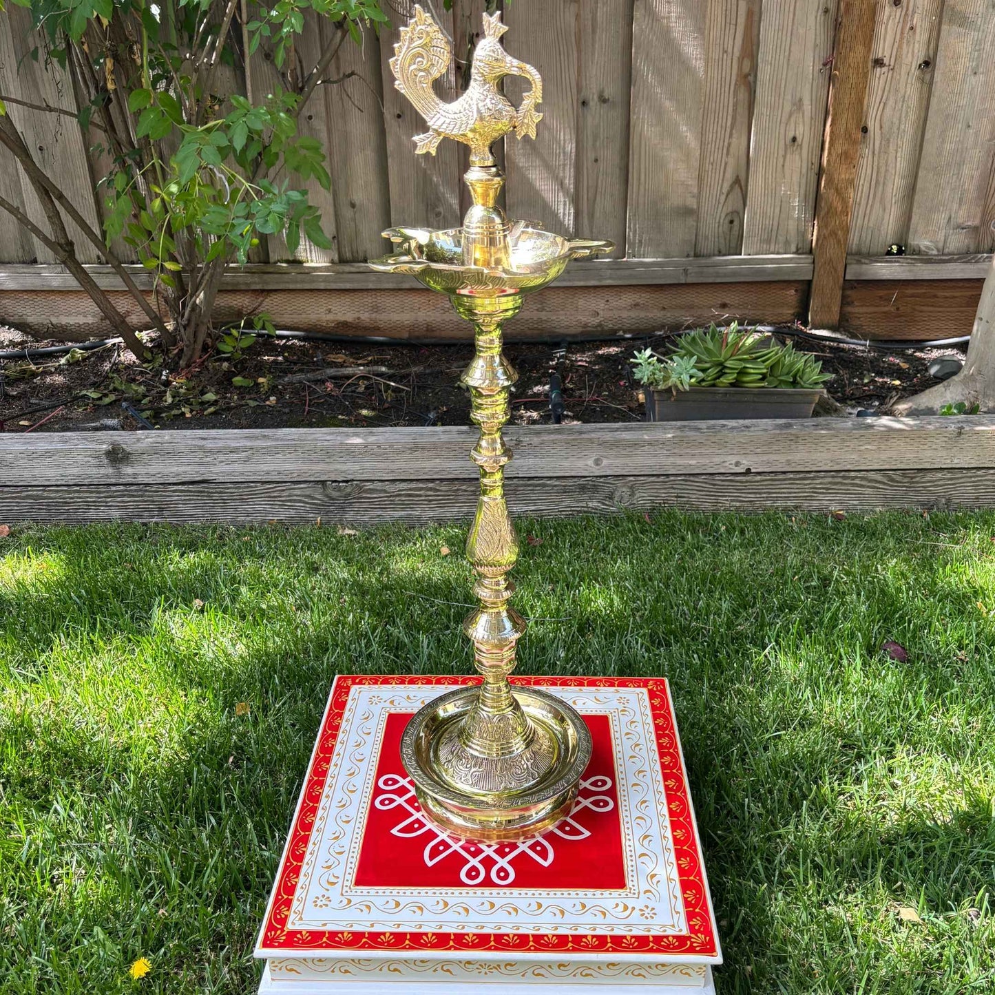 Brass Mahabharat Kuthu Vilakku Diya Oil Lamp displayed in a traditional setting, embodying the essence of brass decor