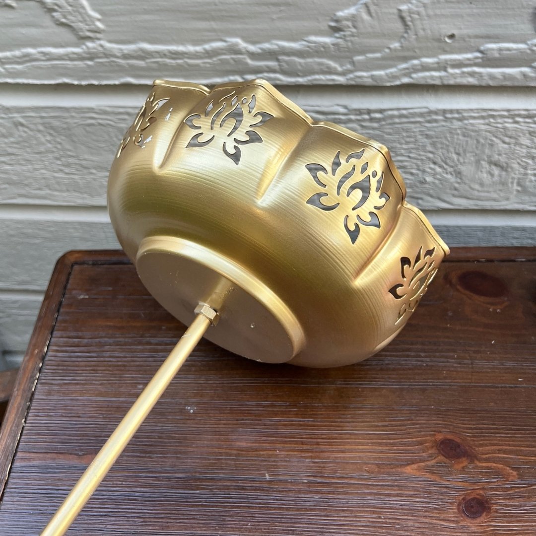 Base and underside view of Gold Lotus Motif Urli by Urli Utsav Decor — shows assembly nut and metal finish for customer assurance