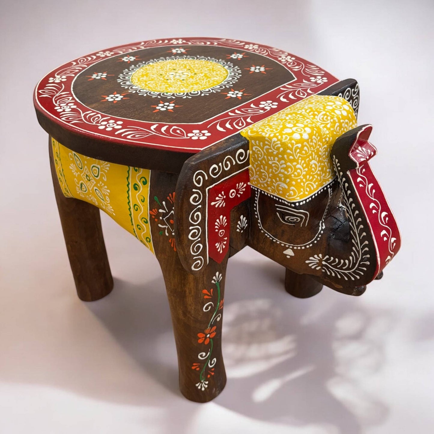 Brown Red Natural Elephant Stool - Bed room furniture, side view of the black elephant stool showcasing sturdy construction and ornate details