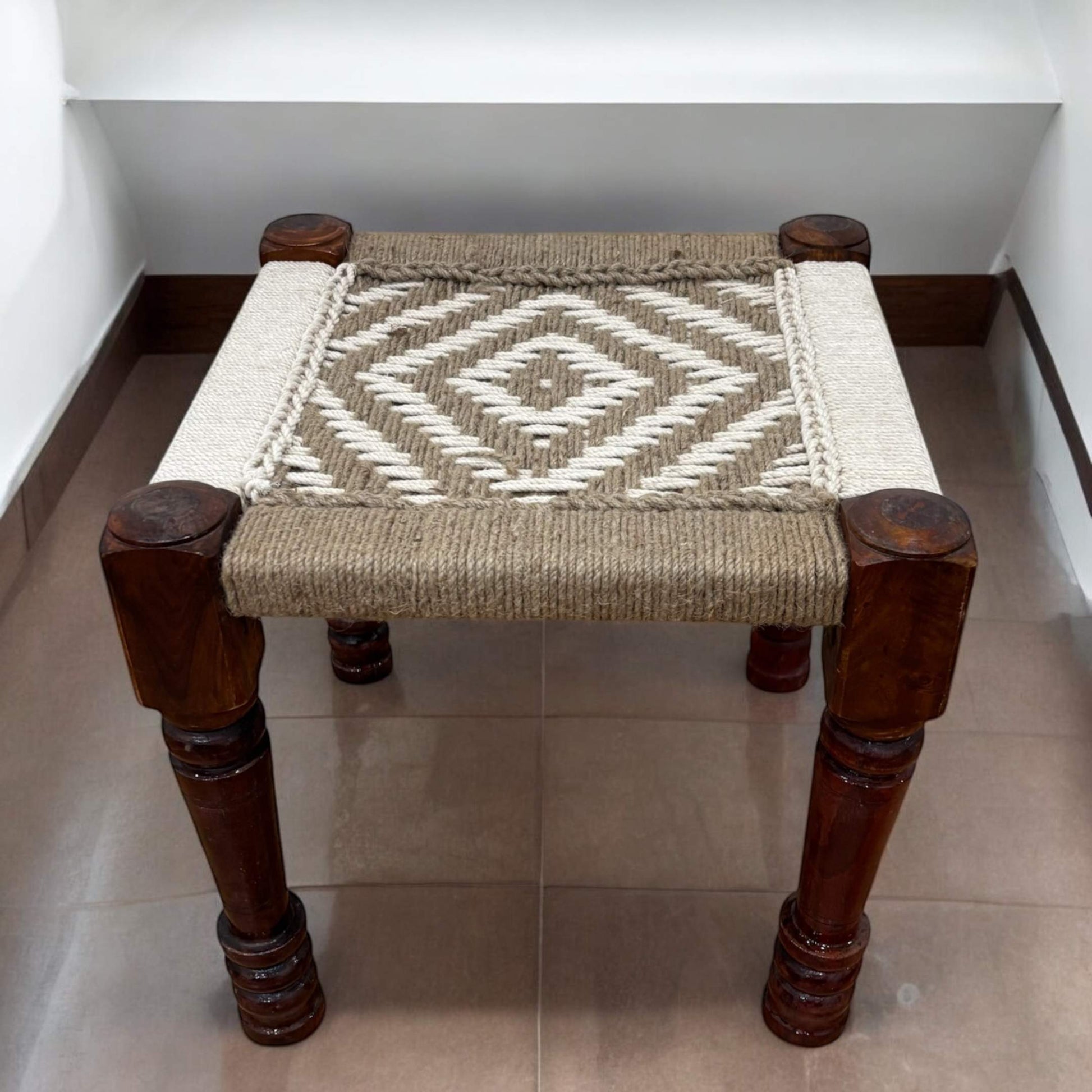 Detailed view of the natural jute cord weaving, highlighting the artisanal craftsmanship and texture.