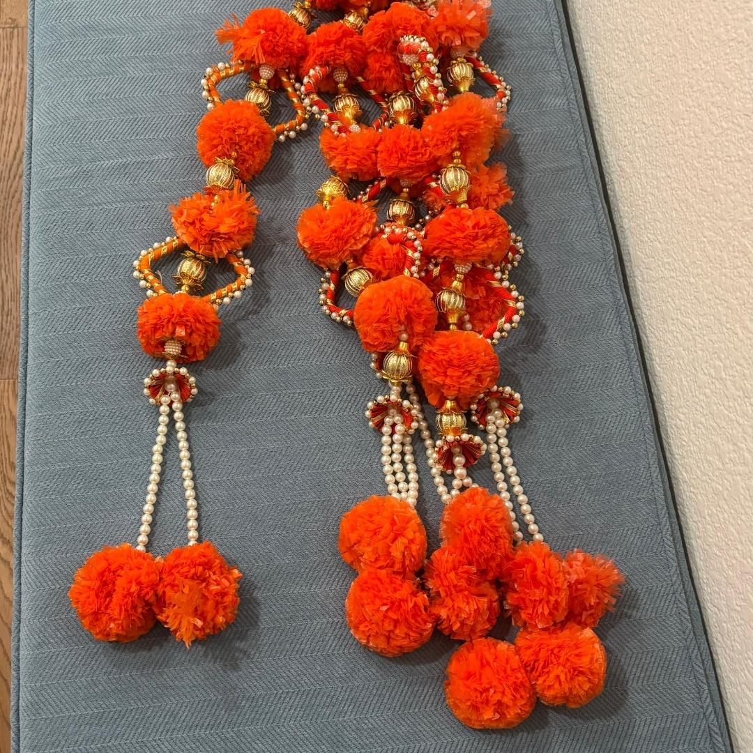 Urli Utsav’s marigold dangler strings - Orange