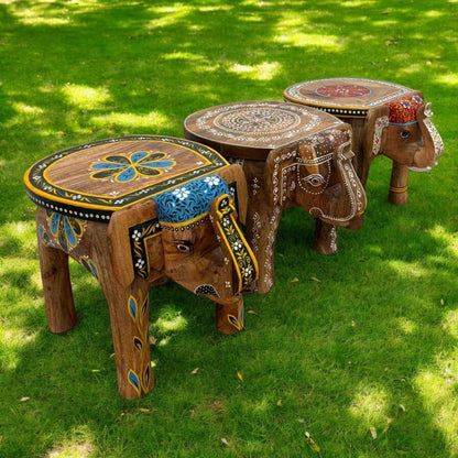 Three Natural Wood Elephant Stool - Boho Side Table & Coffee Table in the backyard
