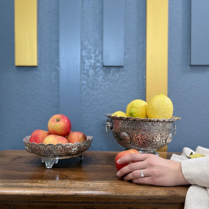 Two silver fruit bowls with apples and lemons against blue wall – German silver centerpiece