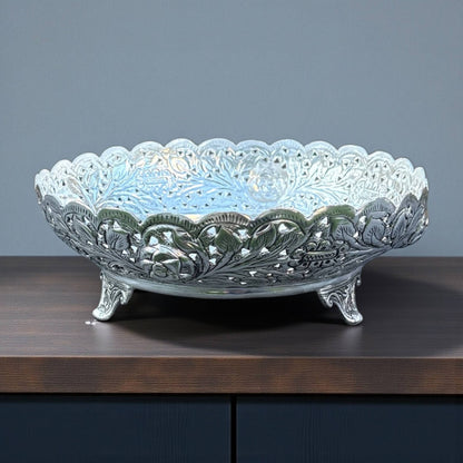 Urli Utsav decor decorative silver fruit bowl empty on neutral background