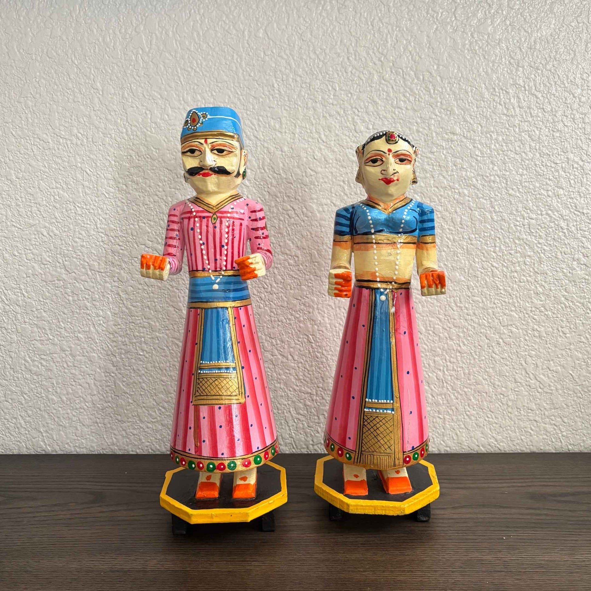 Isar Gangaur Pink dolls showcasing Indian King and Queen figures, hand-painted in vibrant colors with intricate details, made from mango wood
