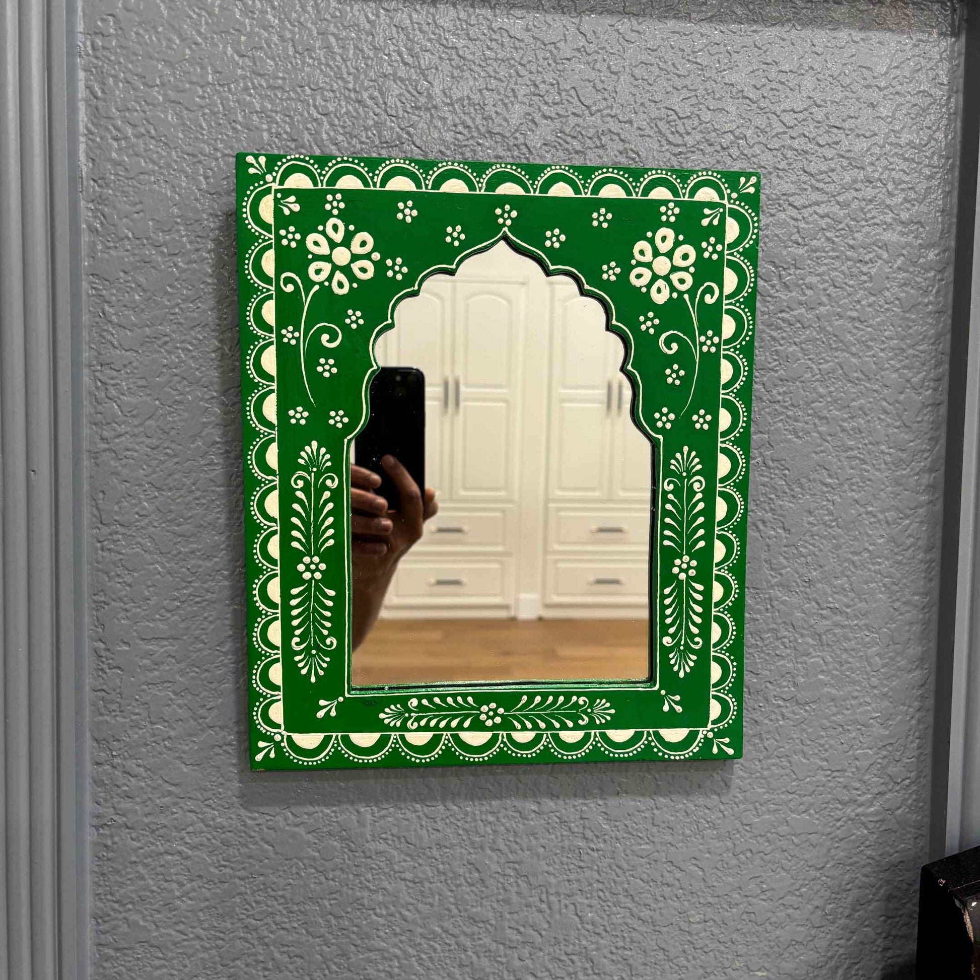 Hand-painted 12x10-inch Green Jharokha mirror in Rajasthani style from Urli Utsav, highlighting its ornate frame and mirror quality