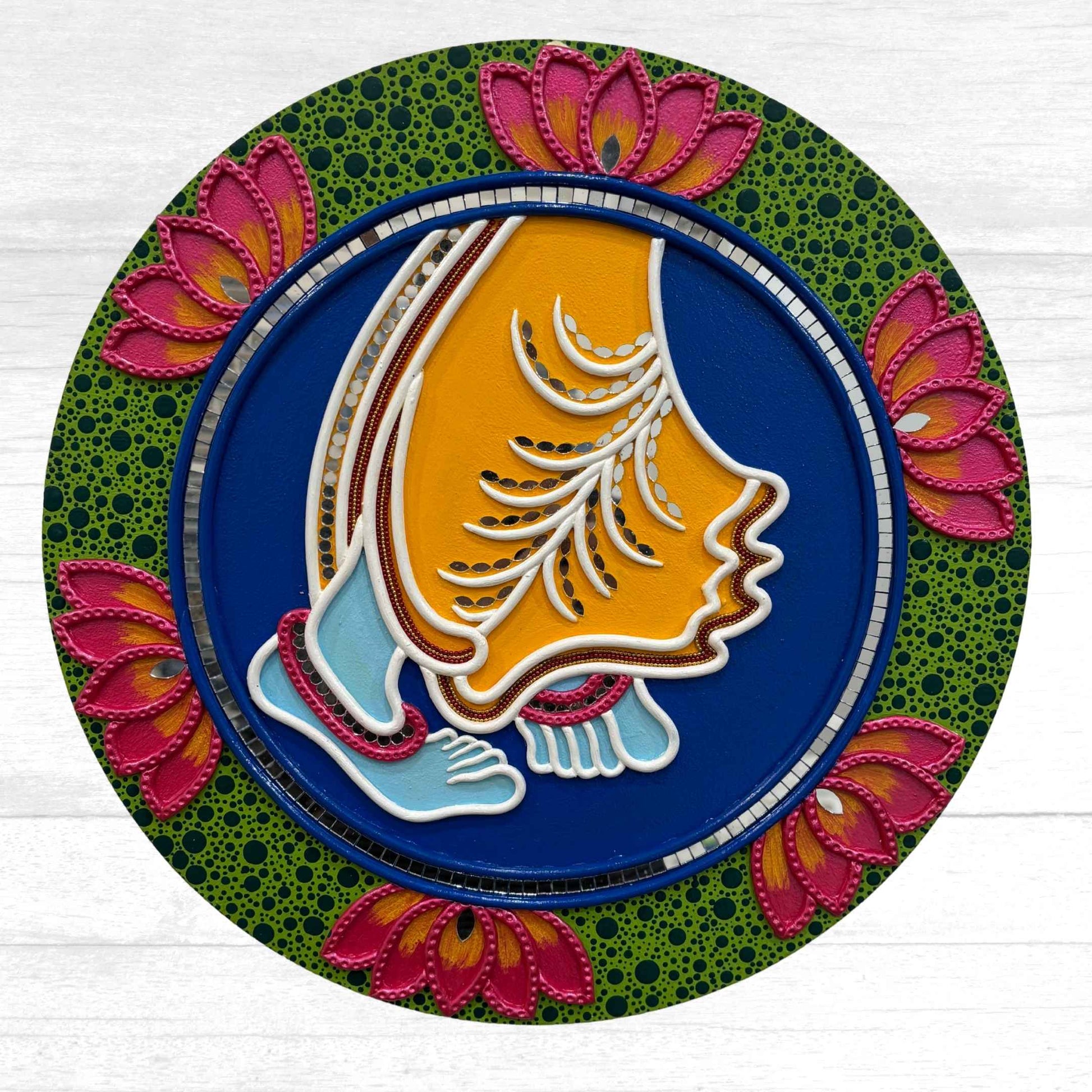 Handmade 14-inch Dancing Feet Lippan wall art with intricate mud and mirror work, symbolizing Krishna's divine dance and spiritual energy.