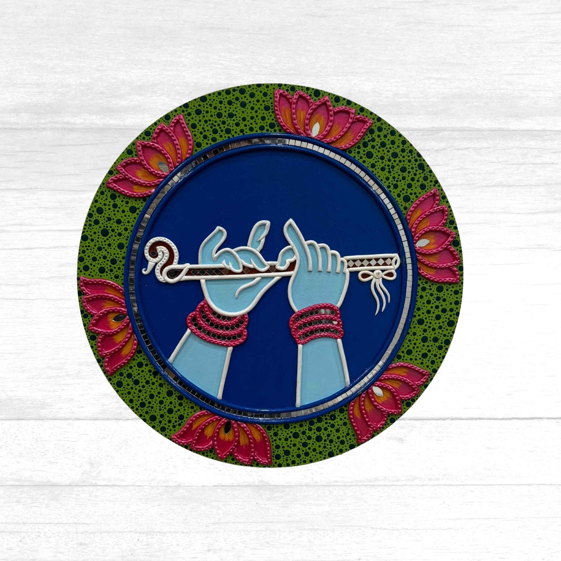 Handmade 14-inch Krishna Flute Lippan wall art with intricate mud and mirror work, symbolizing divine music and spiritual harmony.