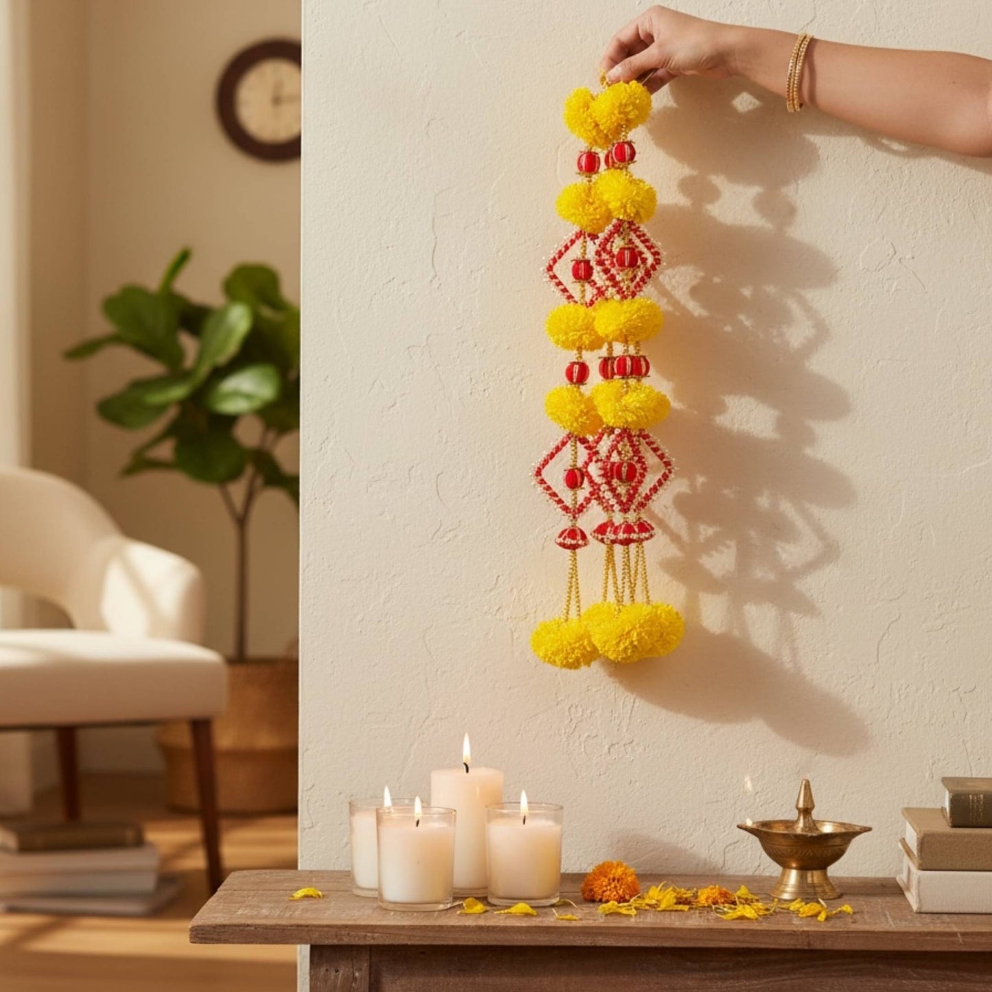 Yellow marigold garland with pearl beads held up showing 2FT length — set of 10 Indian festival wedding decoration handmade