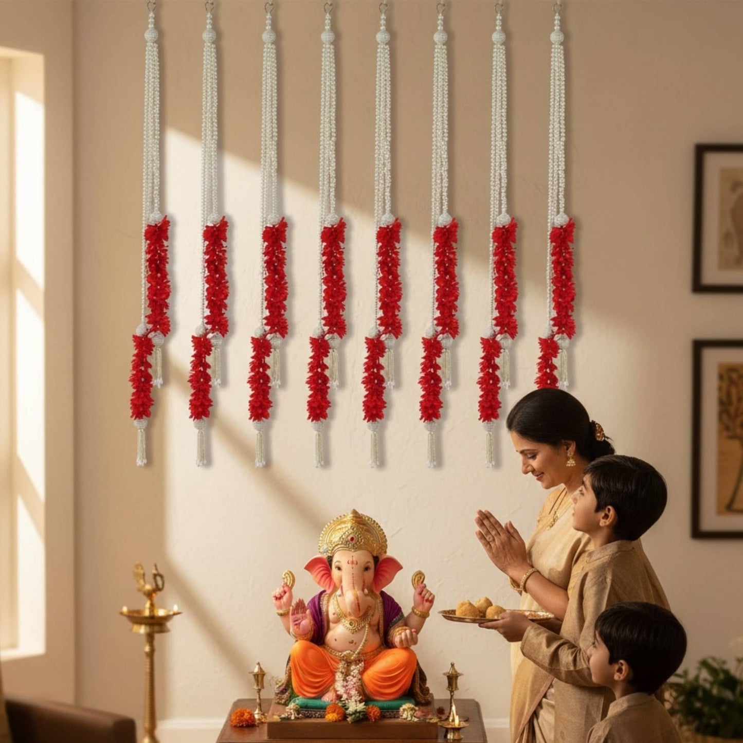Red & white pearl garlands displayed during Ganesh Chaturthi puja – handmade Indian décor