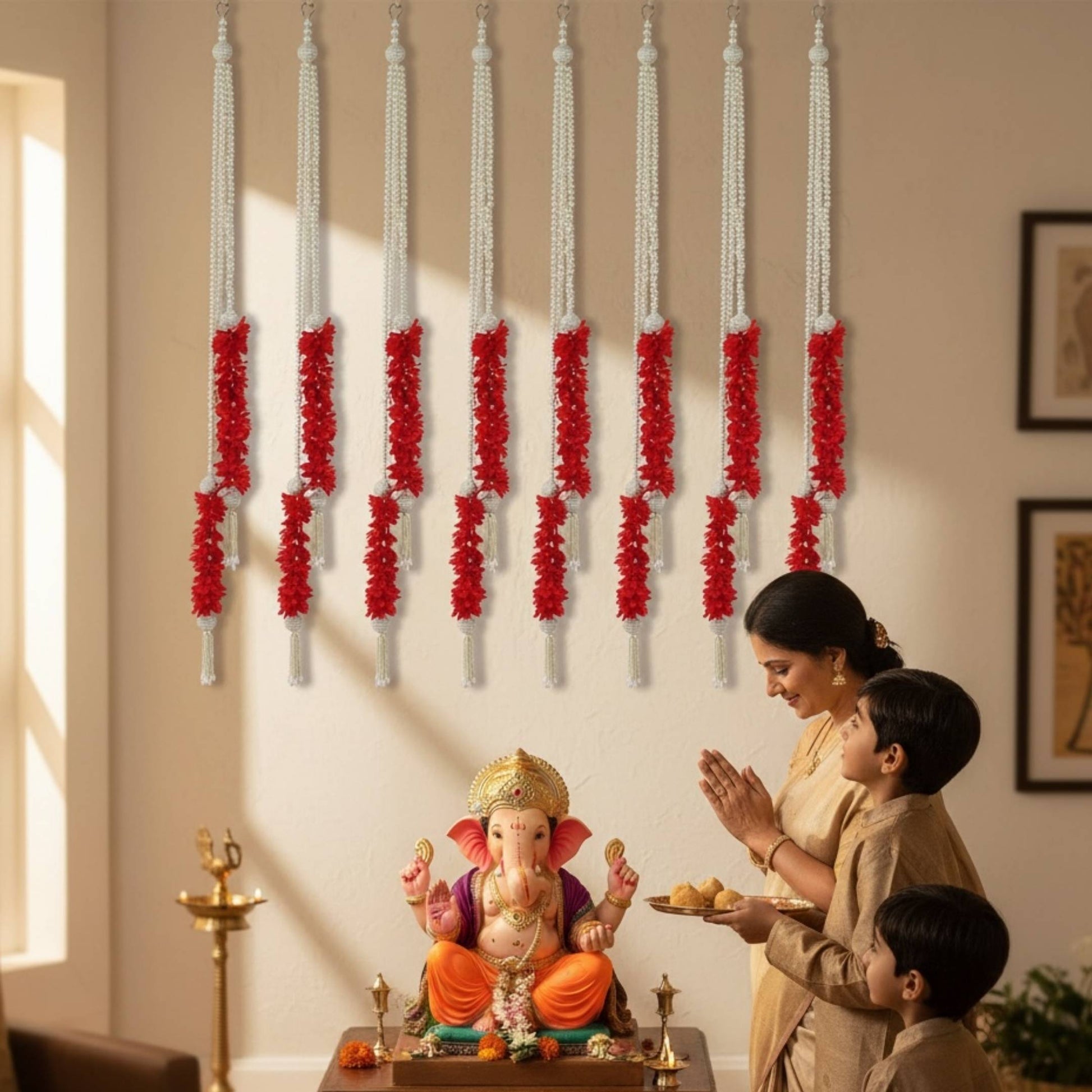 Red & white pearl garlands displayed during Ganesh Chaturthi puja – handmade Indian décor