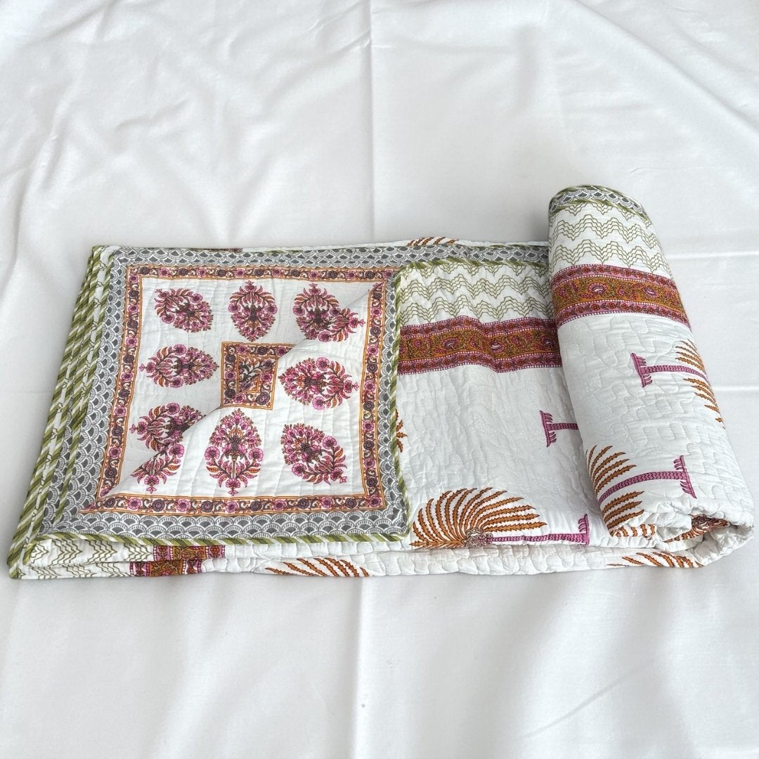 Tropical Palm leaf block print Dohar quilt in a refreshing green and white summer-ready aesthetic.