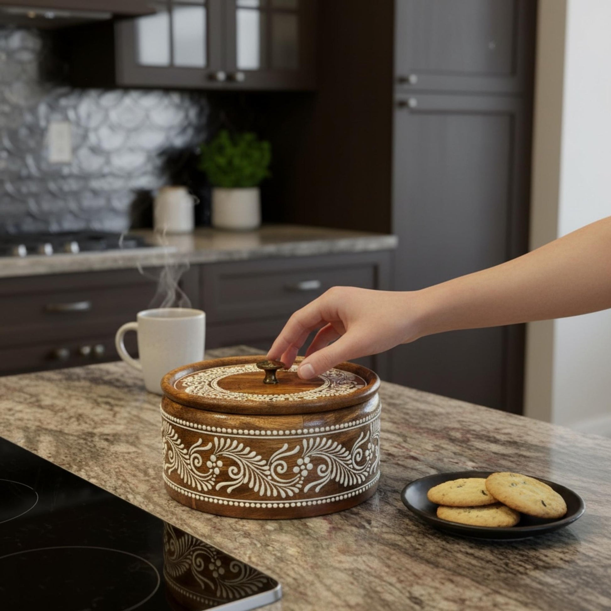 Hand opening decorative mango wood chapati box on kitchen counter – Indian roti keeper