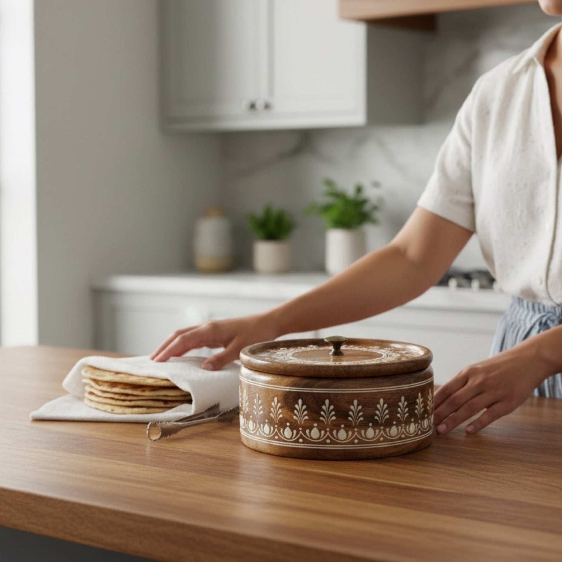 Woman serving roti from handmade mango wood chapati box – Indian bread keeper gift idea