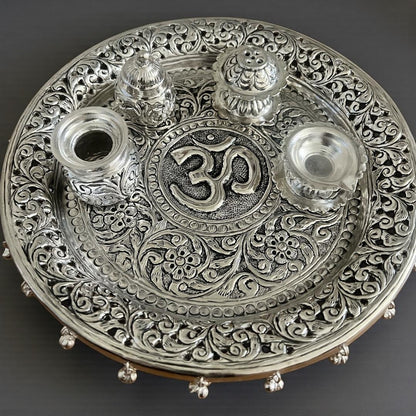 11-inch Om Pooja Thali Set in antique silver-plated brass featuring a central Om motif, Kalash, Agarbatti stand, and Kumkum box for Laxmi Puja 2026.